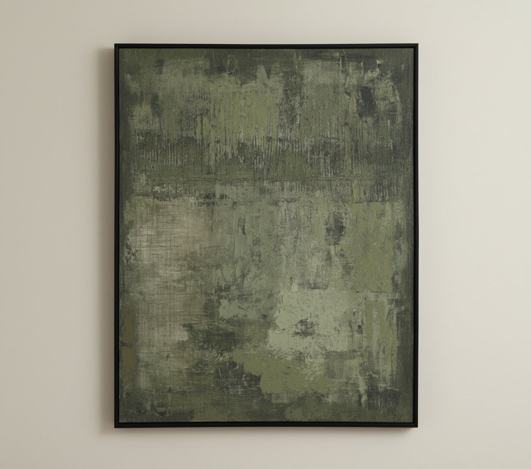 Textured green rug with a black frame on a white background, featuring the brand 'Vanik Living'.
